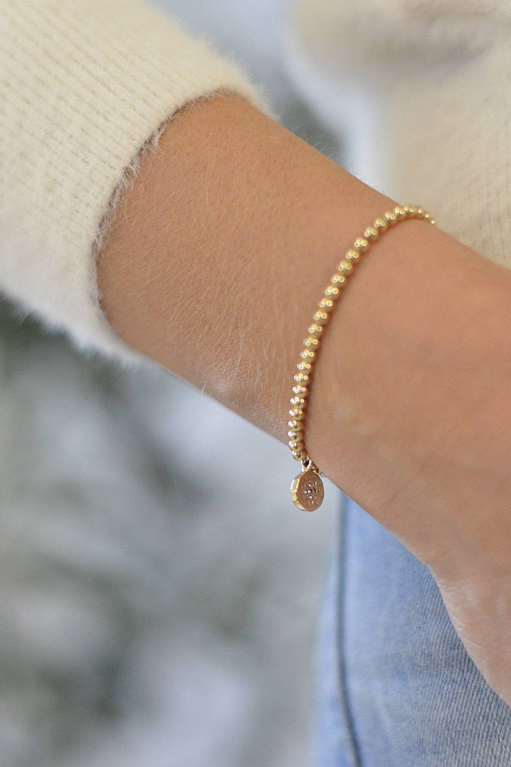 Armband in gold mit Zirkoniastein - Edelstahlperlen und funkelnden Anhänger