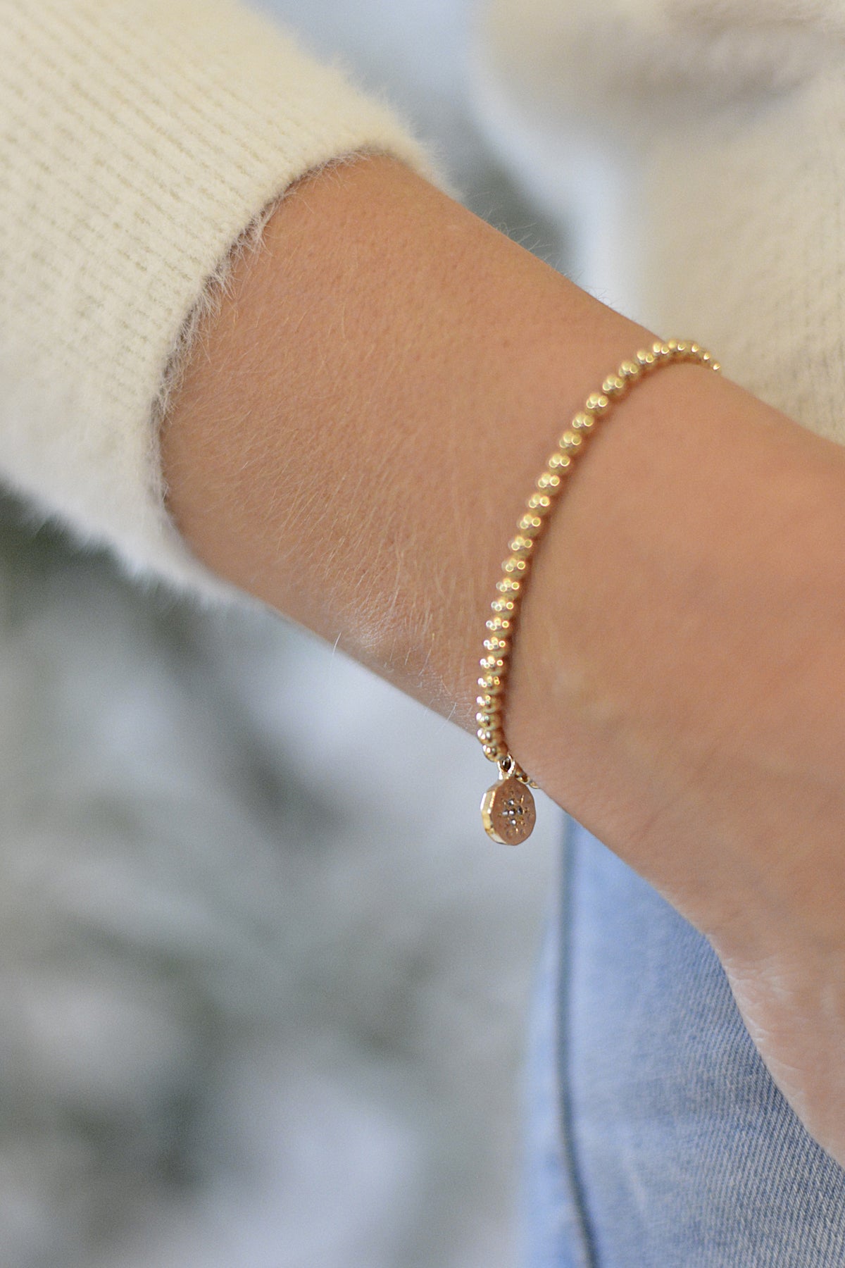 Armband in gold mit Zirkoniastein - Edelstahlperlen und funkelnden Anhänger