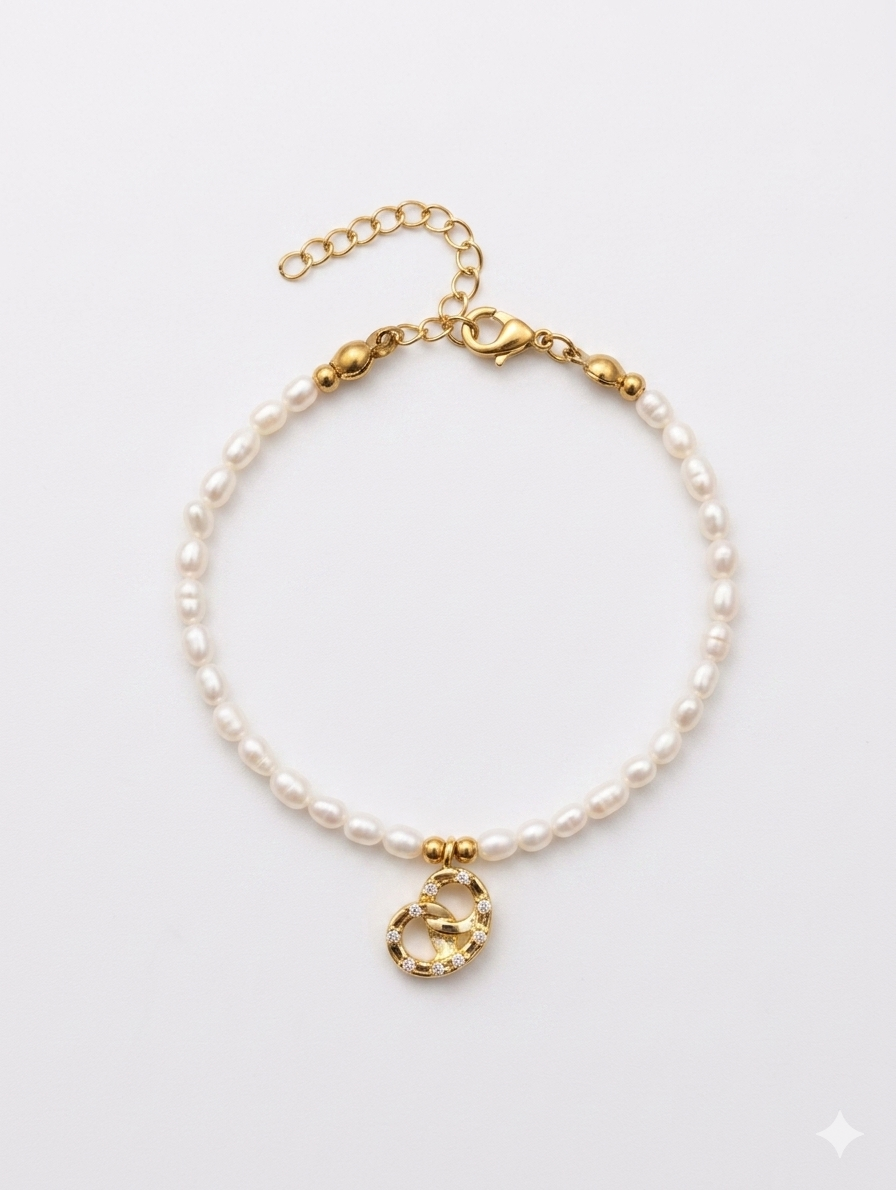 Perlenarmband Brezel Gold – Süßwasserperlenarmband mit Glitzer-Steinen