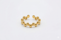Goldfarbener Kugel-Ring im Wellen-Design