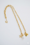 Goldene Gliederkette mit maritimen Anhängern: Seestern, Muschel & Perle